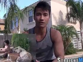 Muscular Asian man masturbating on camera.