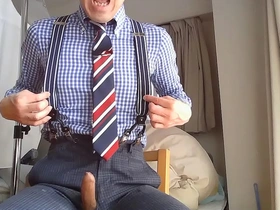 Gay solo masturbation with a fetish for suits and ties.