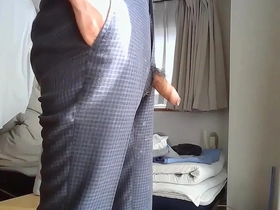 Solo pleasure of an uncut Asian cock