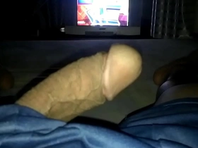 A solo performance of an Asian man with a large penis.