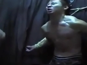 Asian soldier in BDSM roleplay