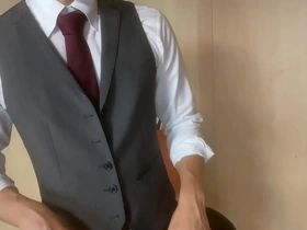 A man from Japan pleasuring himself while in a suit (2)